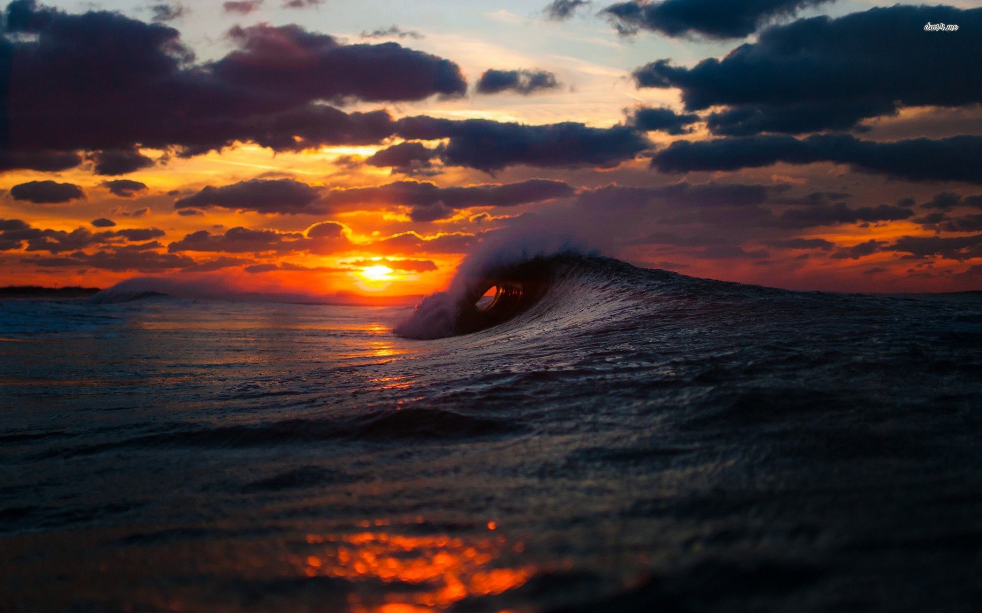 17696-sunrise-above-the-wavy-ocean-1920x1200-beach-wallpaper.jpg