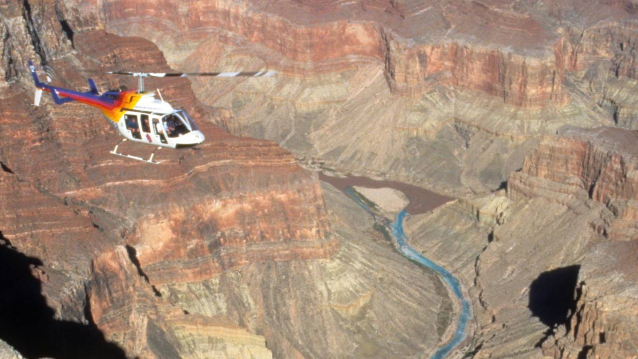 RS2973_scanCafe_0311-rainbow-heli-flying-over-grand-canyon-south-rim.jpeg